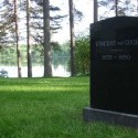 Finnish Countryside - A Tombstone And A Lake